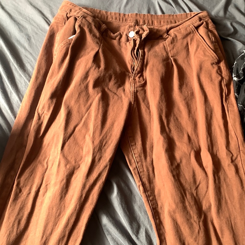 ‘Plus Solid Slant Pocket Mom Jeans’from Shein.